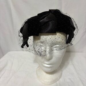vintage black velvet and satin hat with a veil.